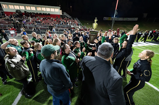 Marion Center Marching Band celebrates Sarah Moore's victory