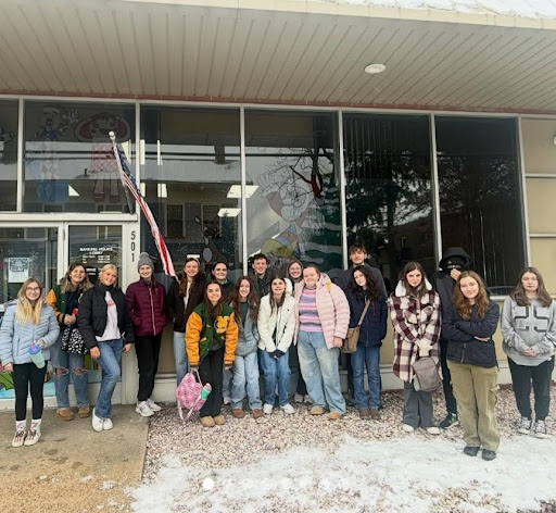 Art students painted the Marion Center Bank windows for h